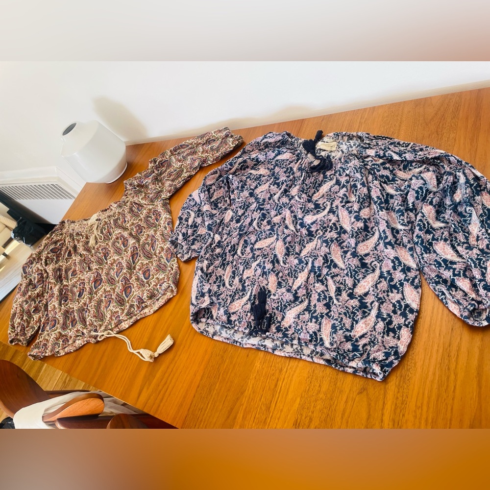 Two Ralph Lauren off the shoulder blouses.